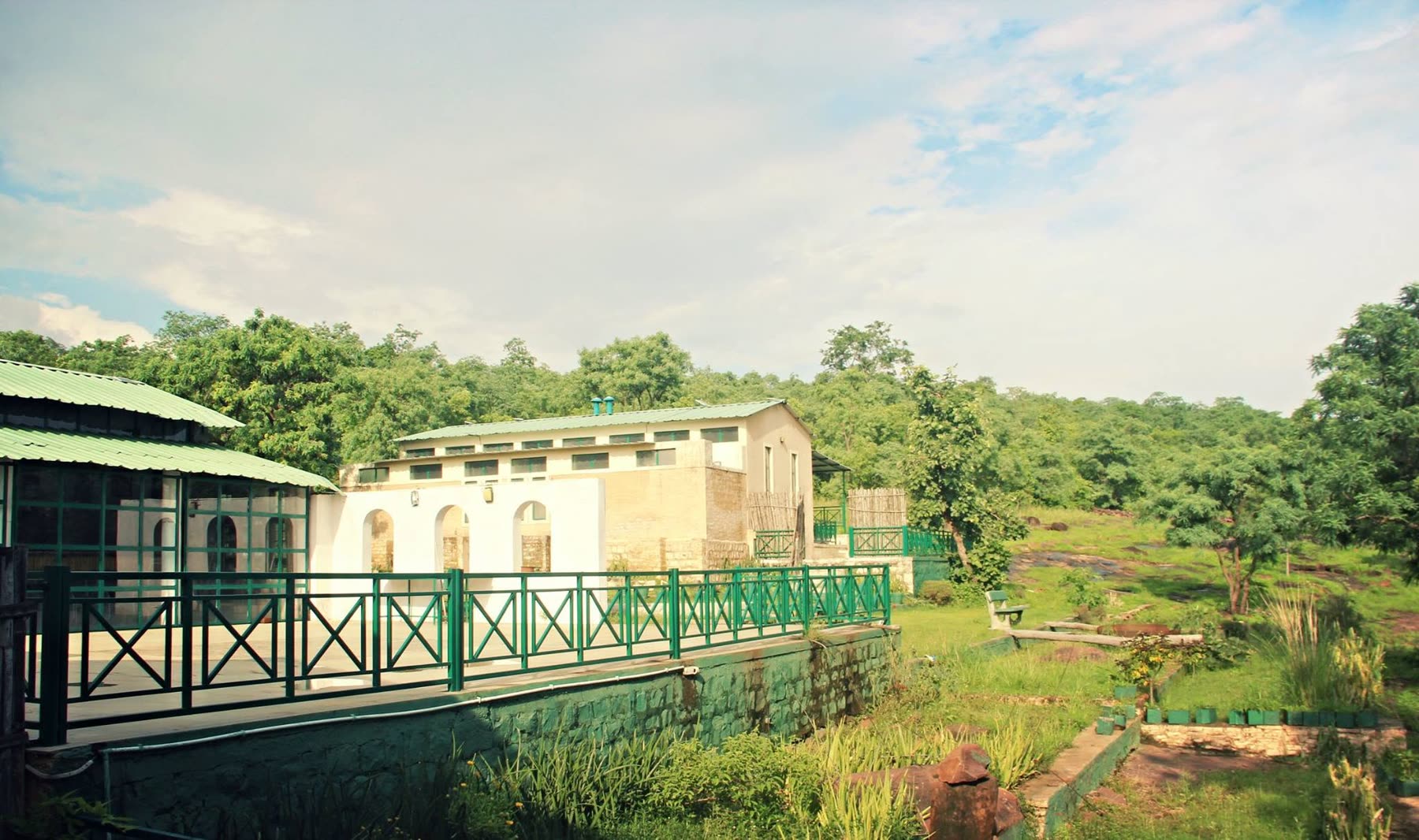 The retreat seen across the green from the forest side