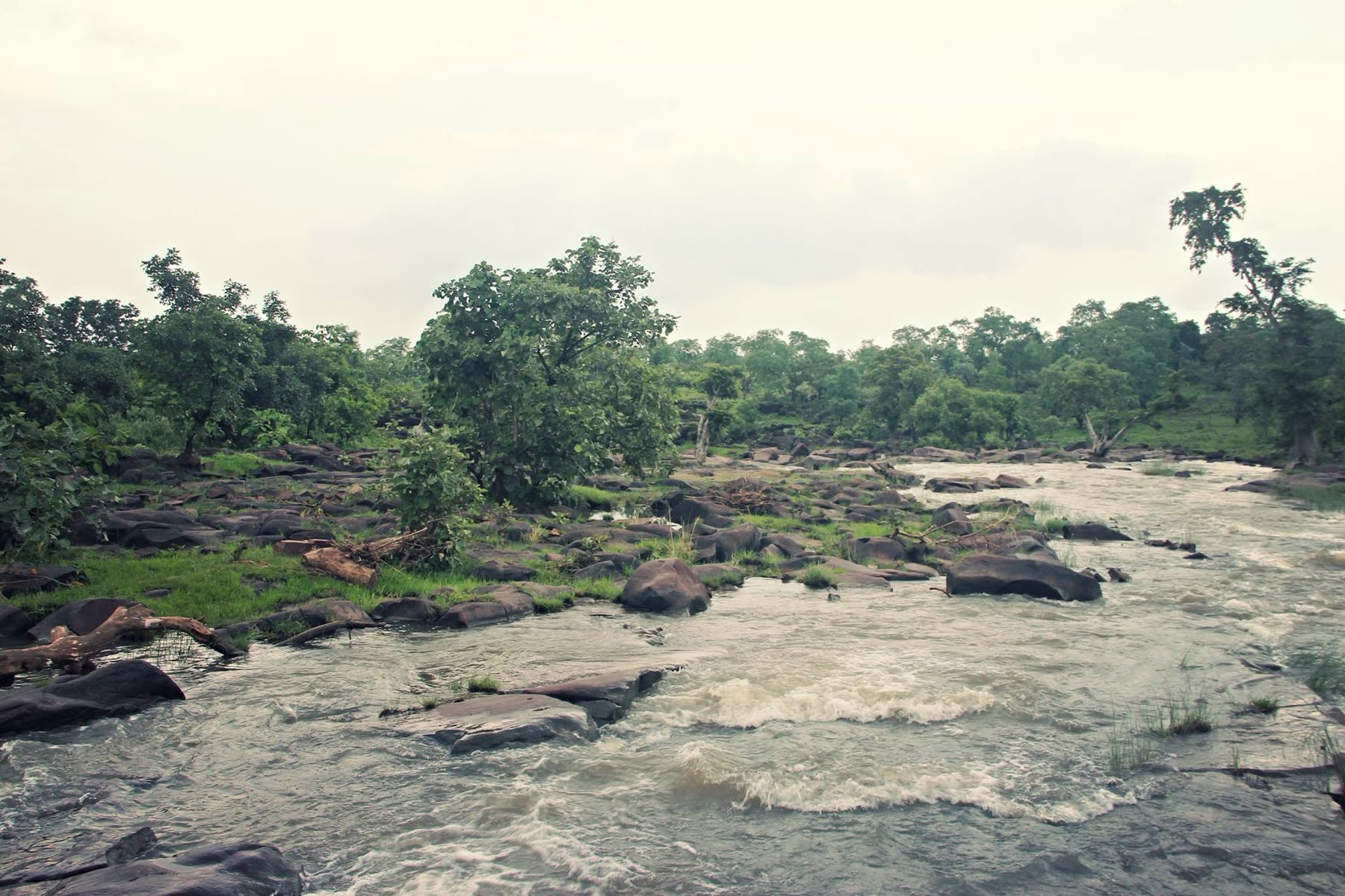 River rushing over rock shelves after the rains