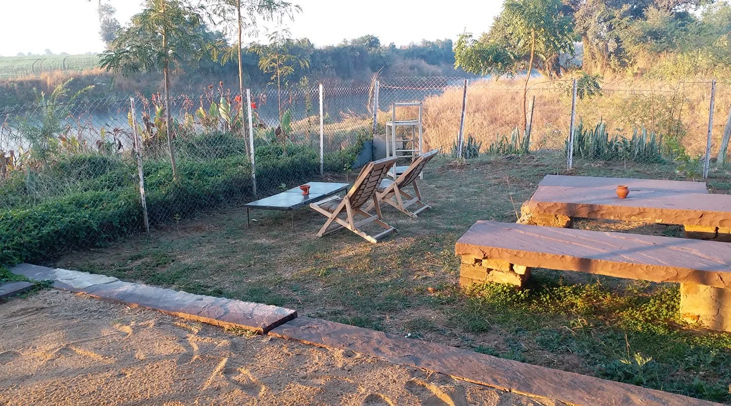 Loungers on the sunset deck as the light fades