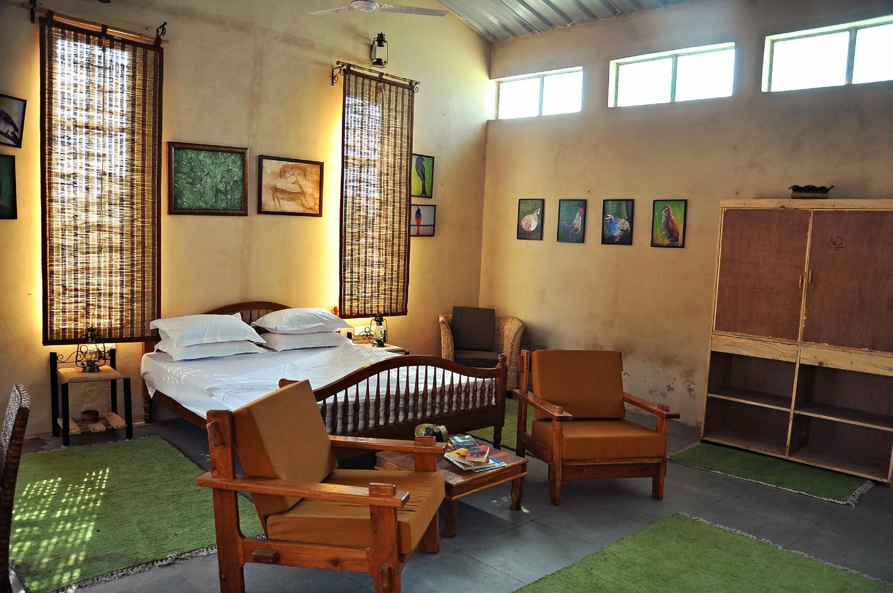 Twin-bedded room at the retreat with forest-facing windows