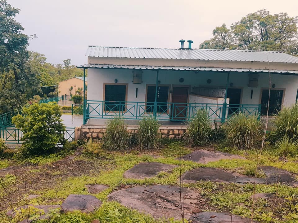 Cottage standing above the natural rock outcrop