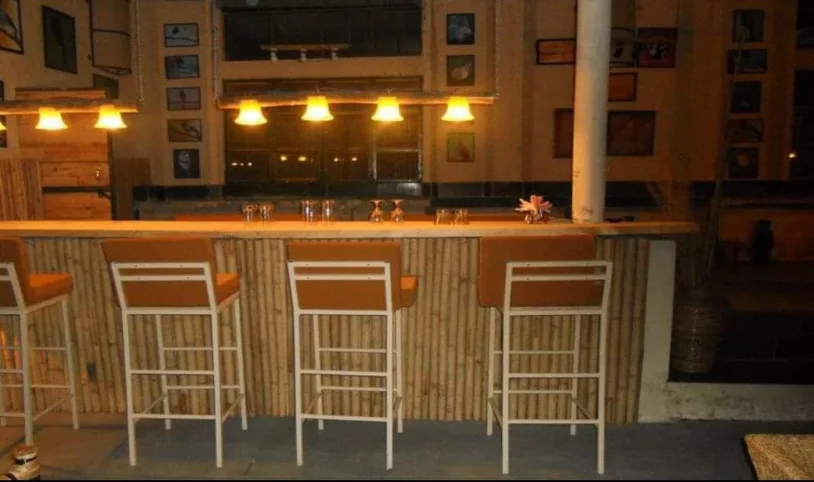 Warmly lit bar and lounge counter