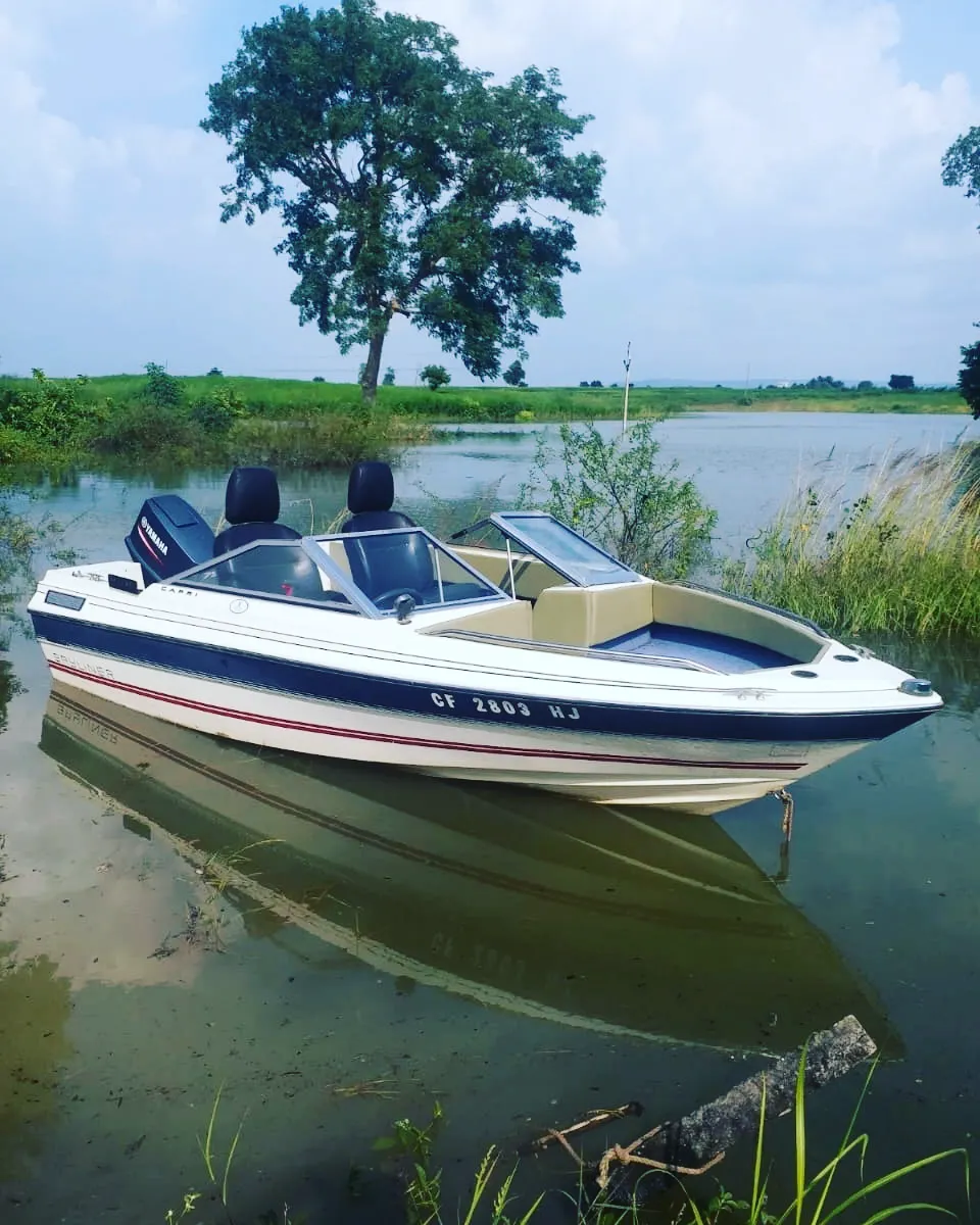 A small boat moored on the lake near the retreat